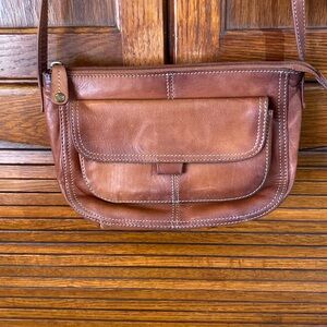Vintage leather crossbody messenger bag.